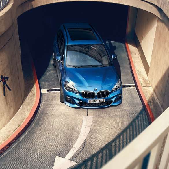 BMW 2 Series Gran Tourer driving in multi-storey car park BMW 2 Series Gran Tourer F46 Facelift 2018 Estoril Blue metallic bird’s-eye view driving in multi-storey car park