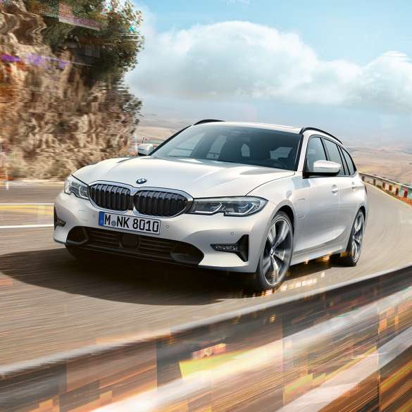 BMW 3 Series Touring, BMW 330e plug-in hybrid BMW 3 Series Touring, BMW 330e plug-in hybrid on a bridge