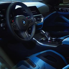 BMW M4 Competition Coupé G82 2020 M Carbon cockpit steering close-up BMW M4 Competition Coupé G82 2020 M Carbon cockpit steering close-up