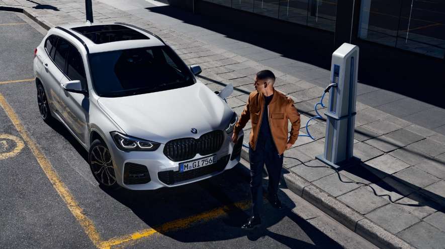 BMW iX3 at a public charging station BMW iX3 charging at a public station