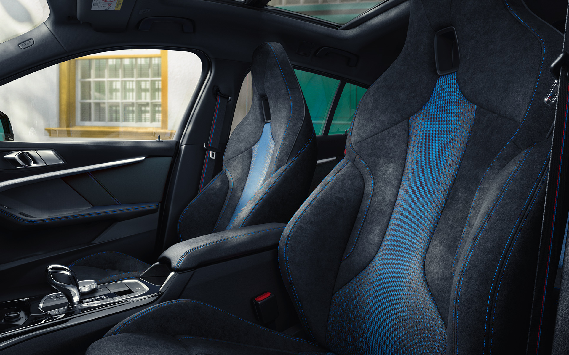 BMW 1 Series F40 M Sport seats Ergonomically shaped M Sport seats in the BMW 1 Series F40 with contrast stitching and integrated headrest.