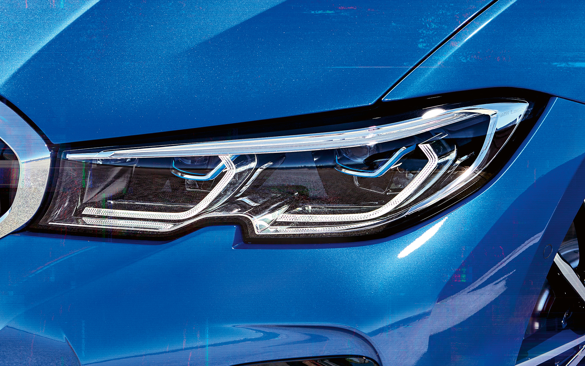 BMW 3 Series Saloon (G20), BMW Laserlight. BMW 3 Series Saloon (G20), BMW Laserlight. Lateral close-up of the right front headlights with BMW laserlight.