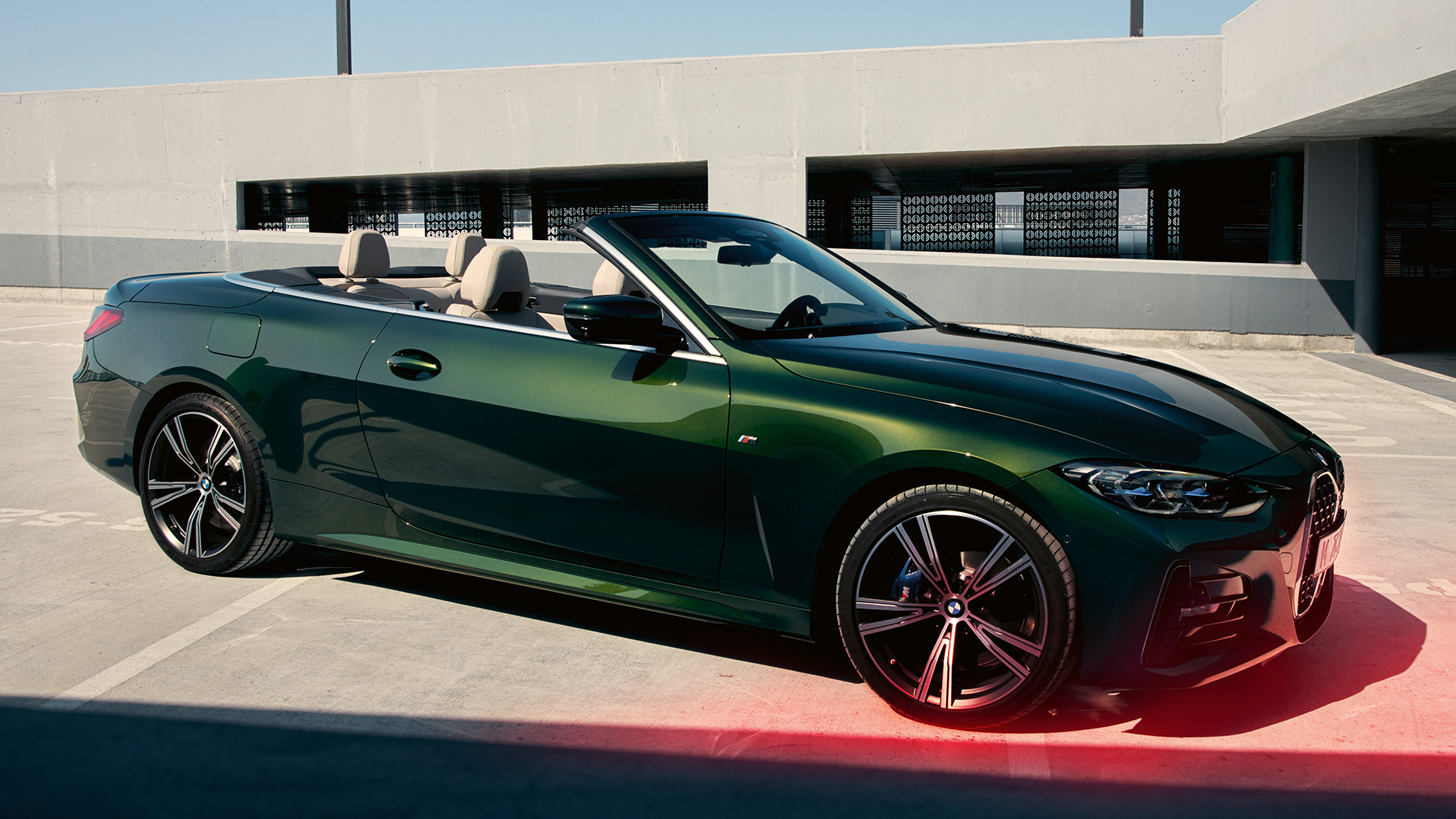 Three-quarter side view BMW 4 Series Convertible G23 2020 parking BMW 4 Series Convertible G23 Sanremo Green metallic 2020 three-quarter side view parking on a parking lot
