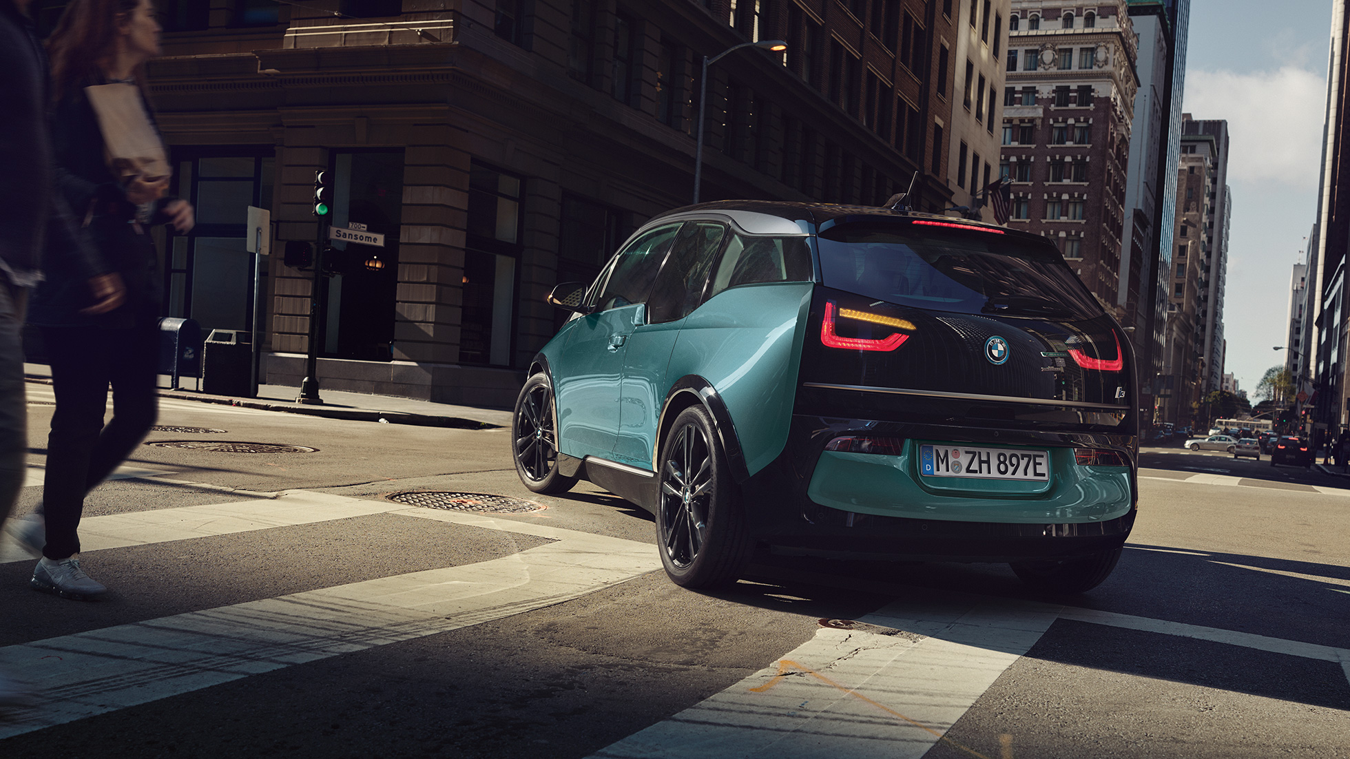 BMW i3 2018 2020 Blue Ridge Mountain with Frozen Grey Highlight three-quarter rear view in motion BMW i3 I01 2020 Blue Ridge Mountain with Frozen Grey Highlight three-quarter rear view in motion
