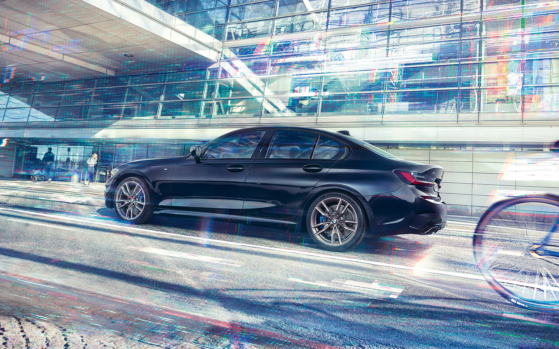 BMW M340i xDrive Saloon G20 2020 Sapphire Black metallic side view in motion