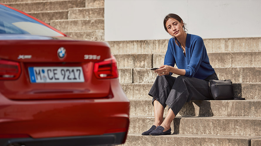 Service & Breakdown Assistance. Woman waiting for Service & Breakdown Assistance.