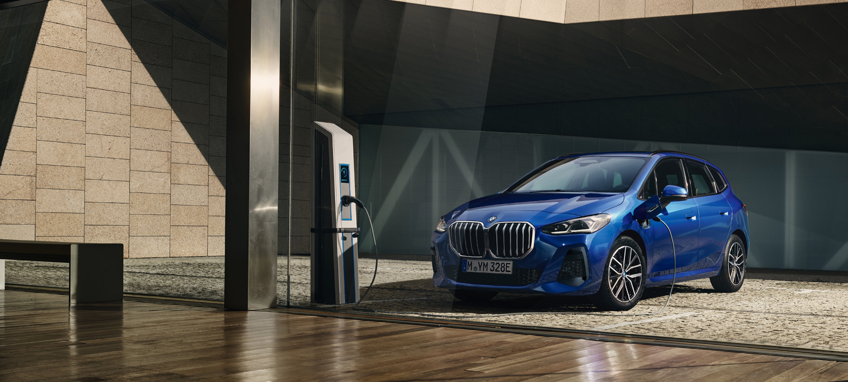 BMW 2 Series Active Tourer 230e plug-in hybrid U06 at charging station BMW e-mobility BMW 2 Series Active Tourer 230e plug-in hybrid U06 at charging station