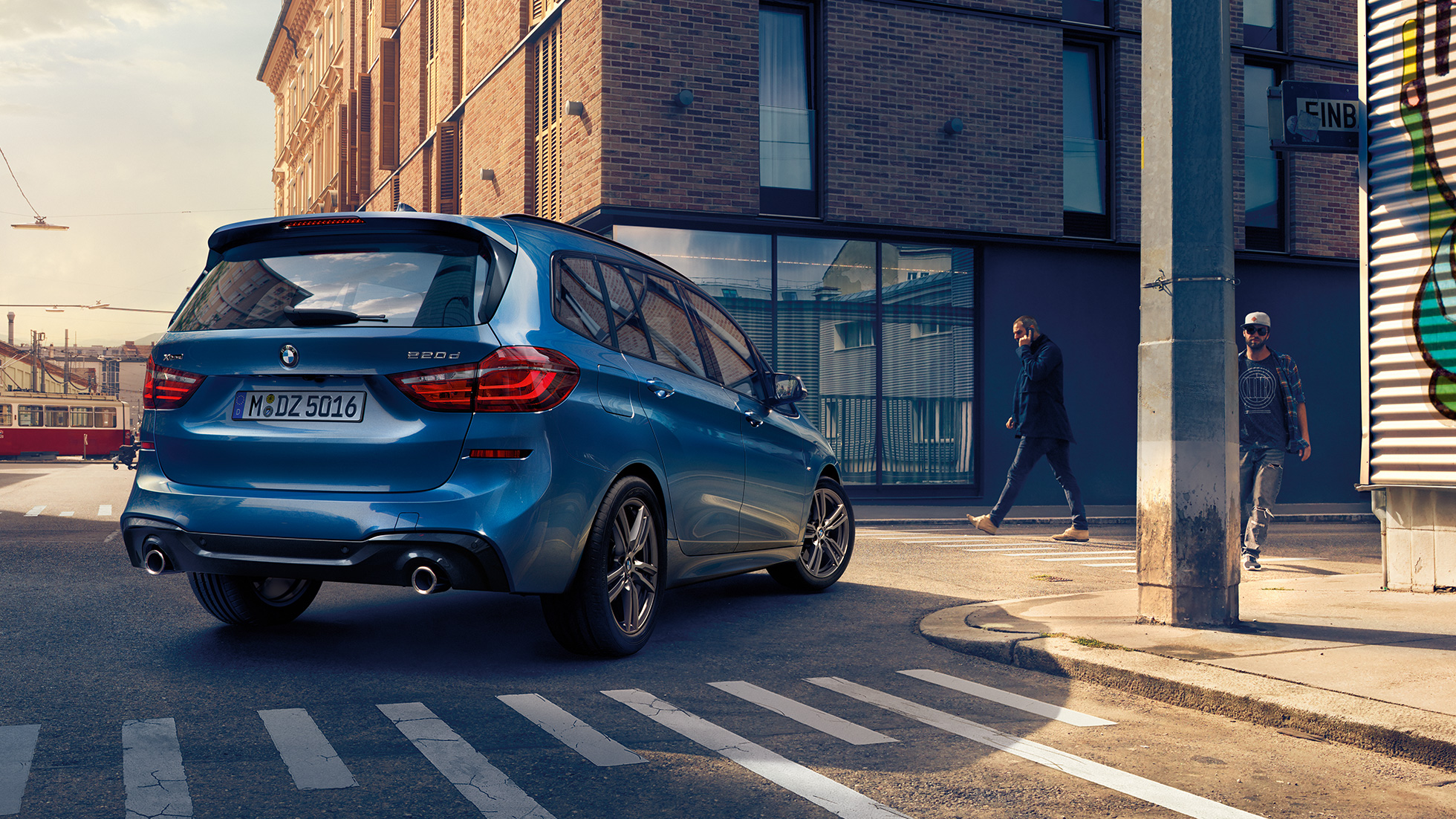 Exterior BMW 2 Series Gran Tourer Exterior BMW 2 Series Gran Tourer 220d xDrive F46 Facelift 2018 Estoril Blue metallic three-quarter rear view driving downtown