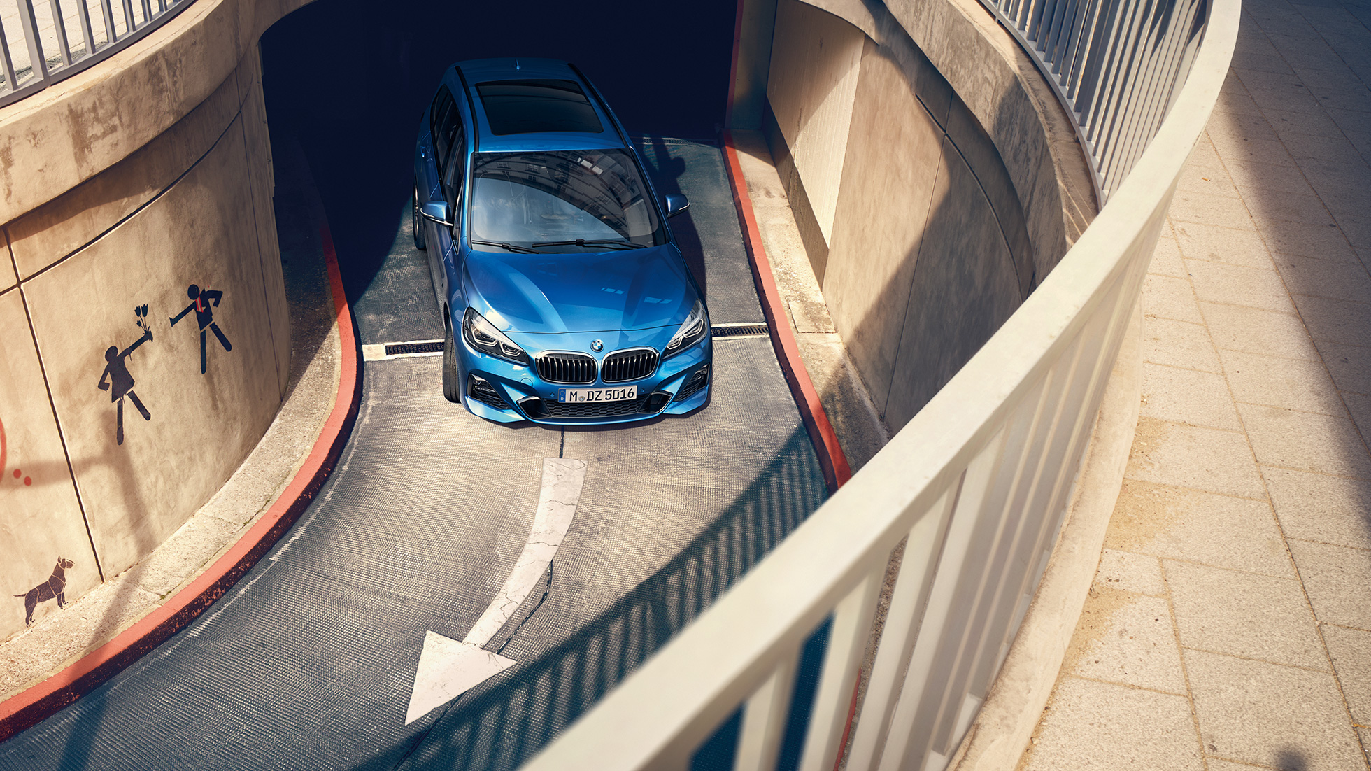 BMW 2 Series Gran Tourer driving in multi-storey car park BMW 2 Series Gran Tourer F46 Facelift 2018 Estoril Blue metallic bird’s-eye view driving in multi-storey car park