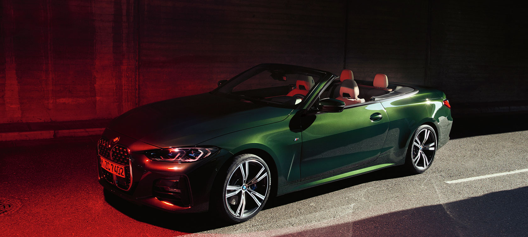 Three-quarter side view BMW 4 Series Convertible G23 2020 BMW 4 Series Convertible G23 2020 San Remo Green metallic three-quarter side view