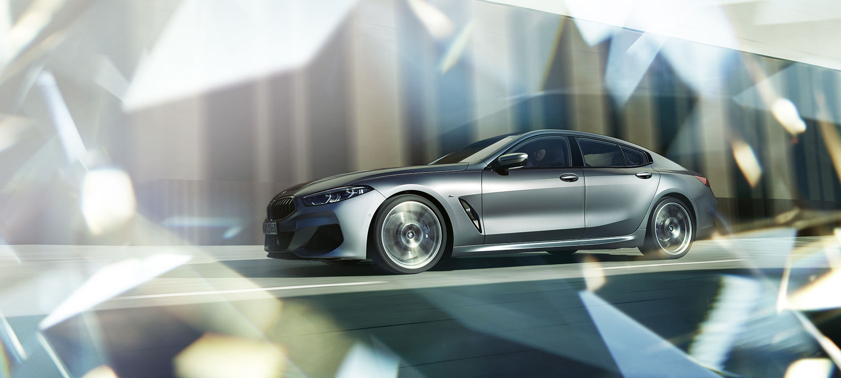 BMW 8 Series Gran Coupé driving BMW 8 Series Gran Coupé driving