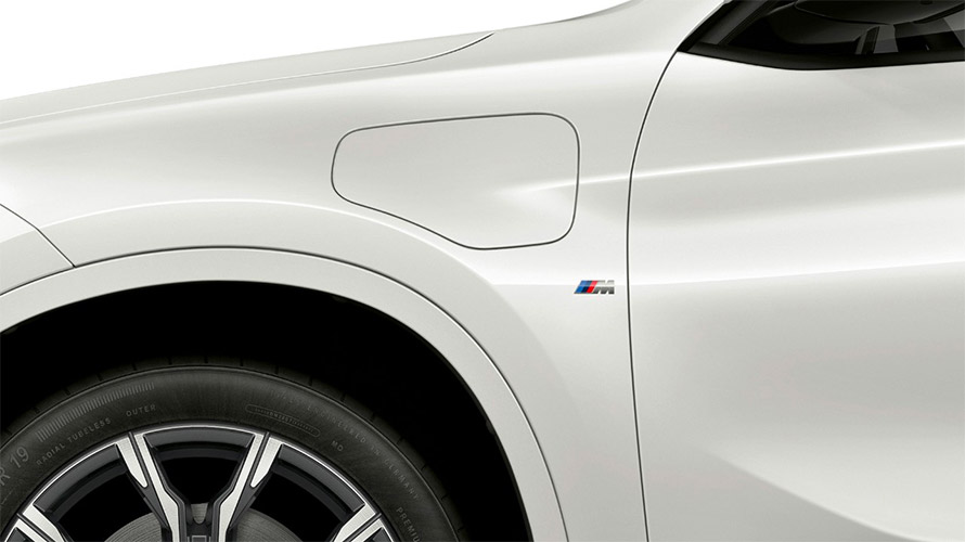 Port for external charging BMW X1 xDrive25e F48 Port for external charging BMW X1 xDrive25e F48 2019 close-up lateral front