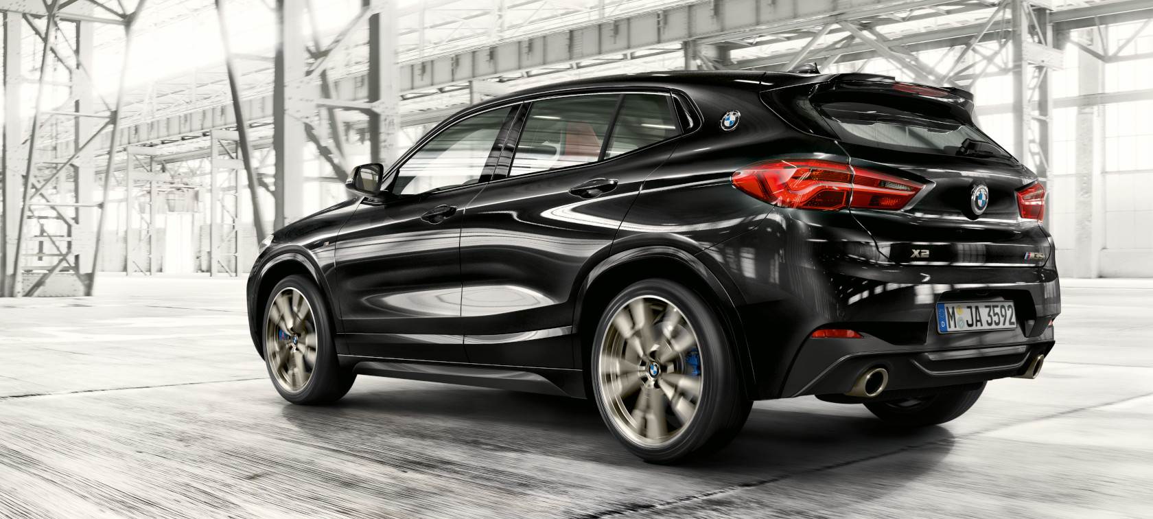 Side view BMW X2 F39 Side view BMW X2 F39 Brooklyn Grey driving