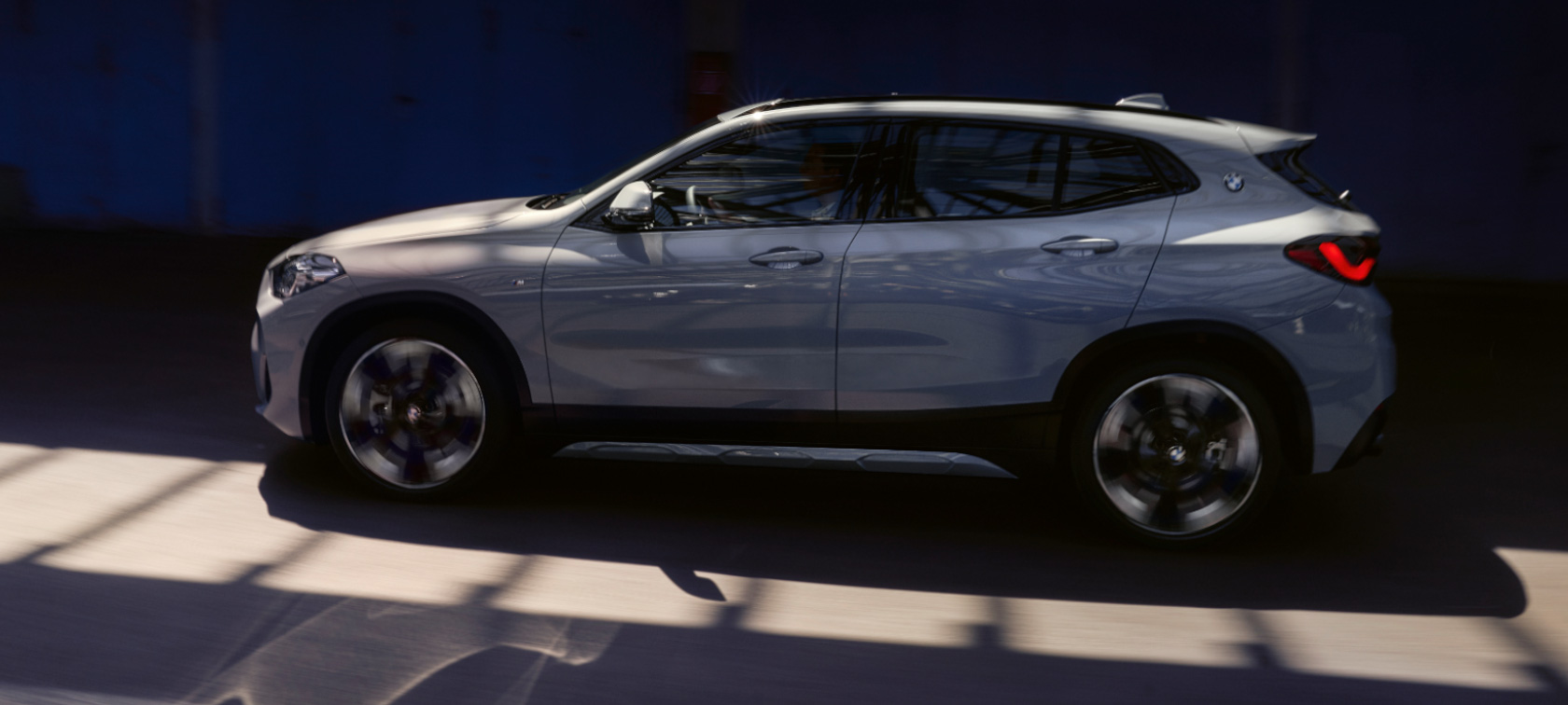 Side view BMW X2 F39 Side view BMW X2 F39 Brooklyn Grey driving