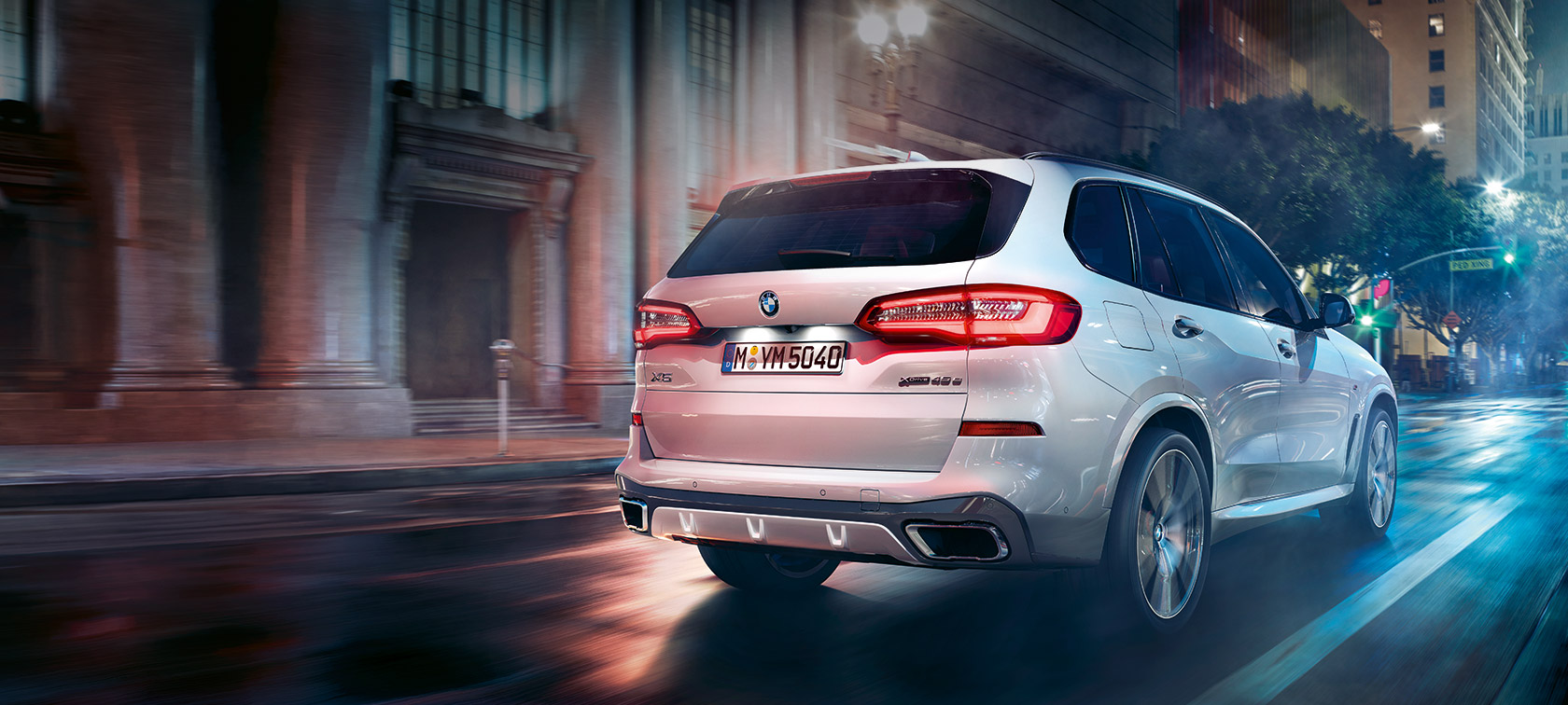 BMW X5 xDrive45e rear 3/4 view BMW X5 xDrive45e rear 3/4 view