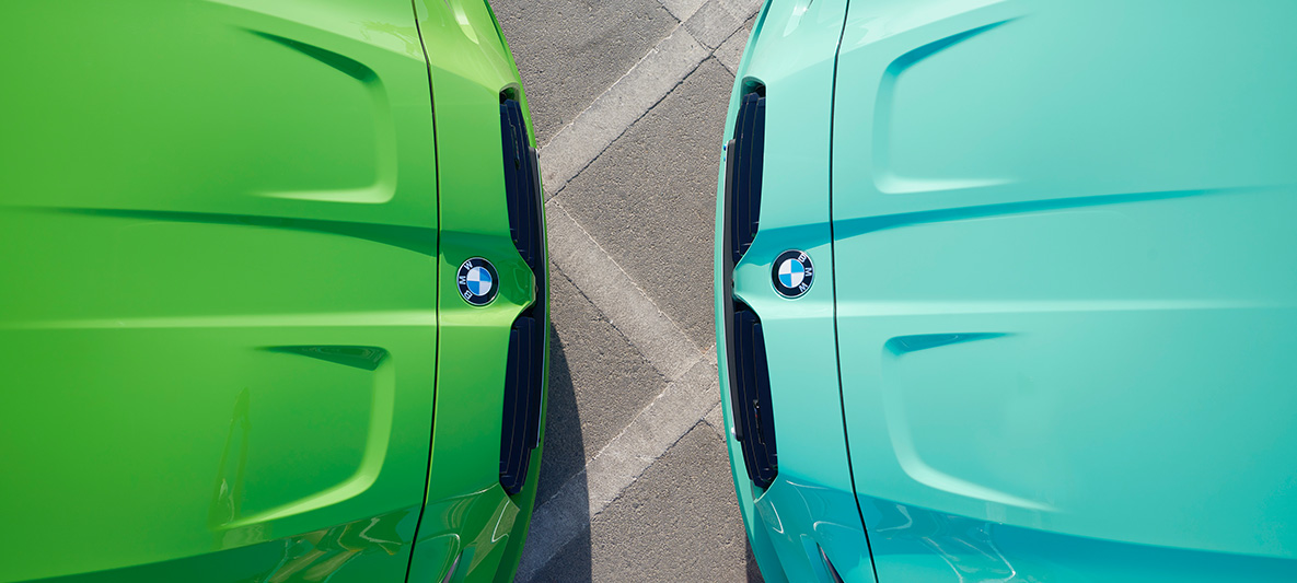 BMW M3 Saloon G80 2021 BMW Individual Verde Mantis three-quarter and BMW M3 Saloon G80 2021 BMW Individual Mint Green face front to front in cutaway bird's-eye view BMW M3 Saloon G80 2021 BMW Individual Verde Mantis three-quarter and BMW M3 Saloon G80 2021 BMW Individual Mint Green face front to front in cutaway close-up bird's-eye view