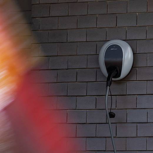 BMW iX1 U11 BEV Charging situation in front of garage 
