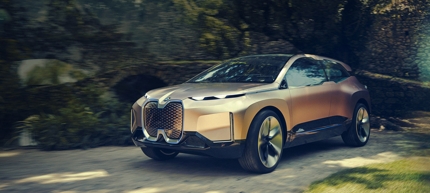 Three quarter front shot of the BMW Vision iNEXT Three quarter front shot of the BMW Vision iNEXT in front of stone wall