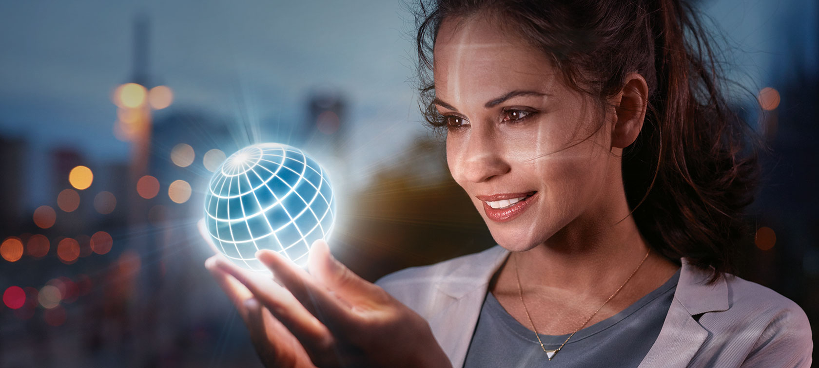 BMW ConnectedDrive Woman holding globe.