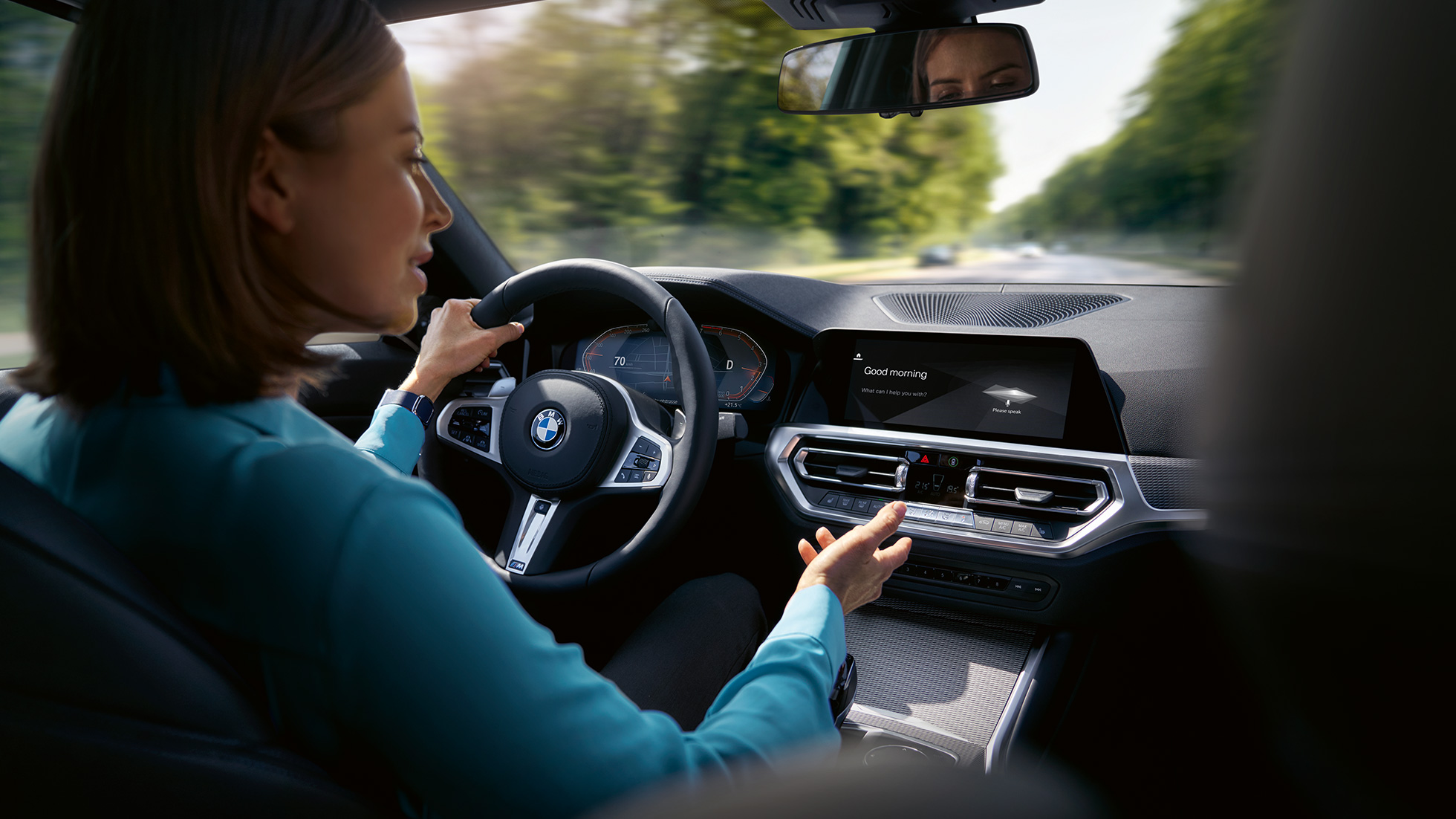 BMW Intelligent Personal Assistant car expert BMW Intelligent Personal Assistant car expert woman driving a BMW