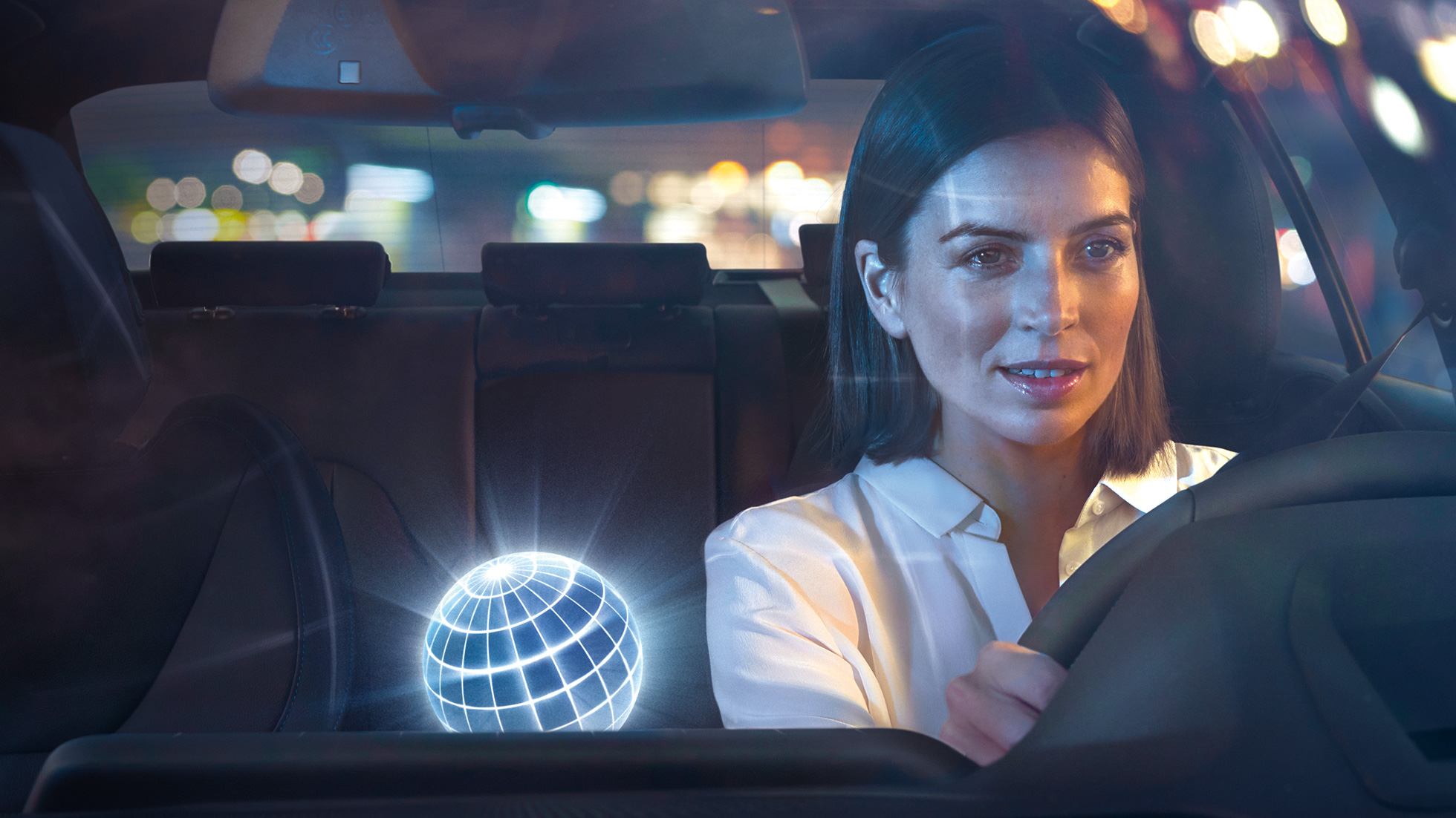 BMW Intelligent Personal Assistant natural interaction Woman talks to BMW Intelligent Personal Assistant while driving her BMW