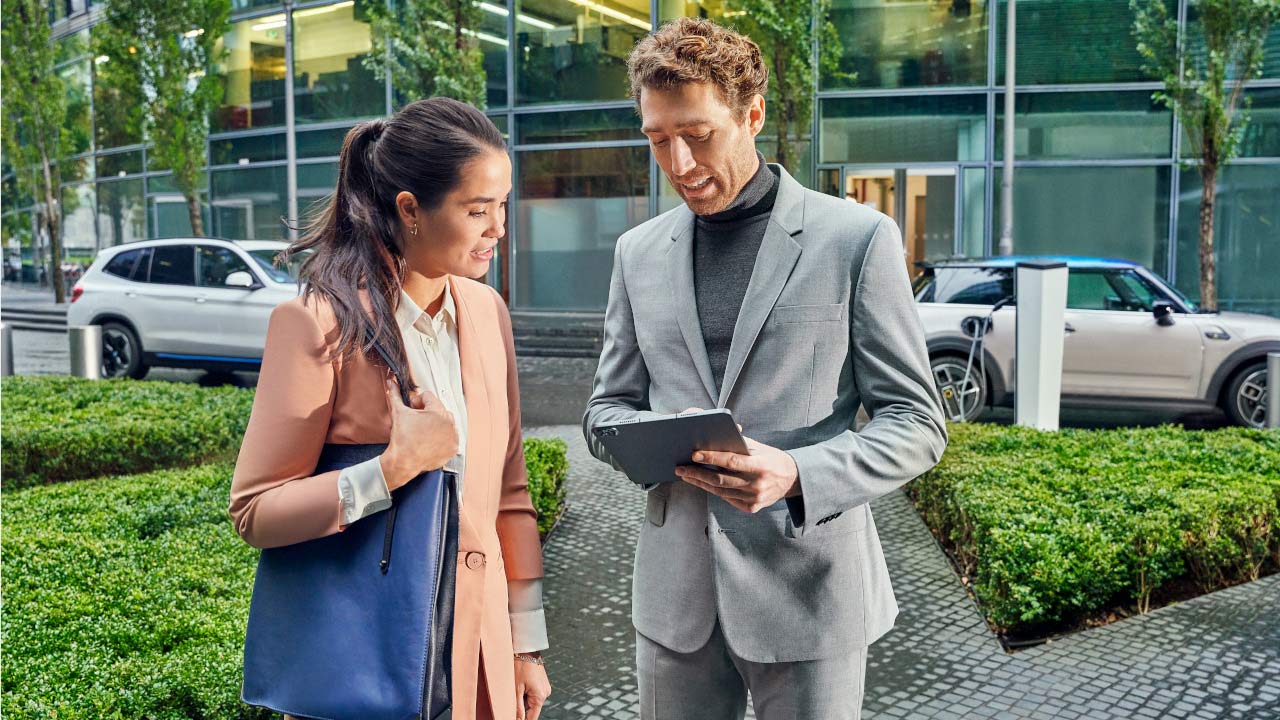 Woman looking at a BMW Woman looking at a BMW